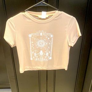 Tan tank top with zodiac design